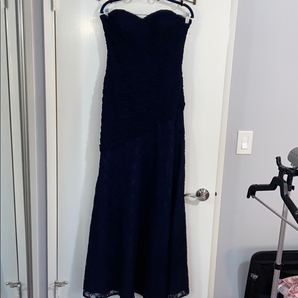 Elegant strapless Navy blue lace evening gown.